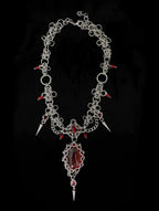 gothic crown statement necklace with red gemstone dark alternative jewellery